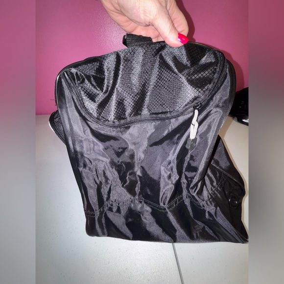 Black Duffel Bag with White Accents and Modern Design - Picture 2 of 13